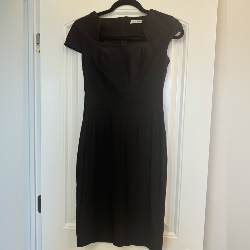 Fitted sheath dress. Like new